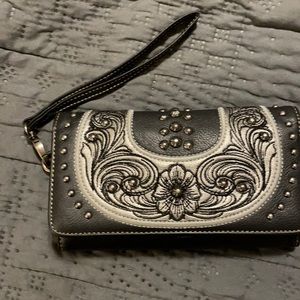 Montana West wristlet.